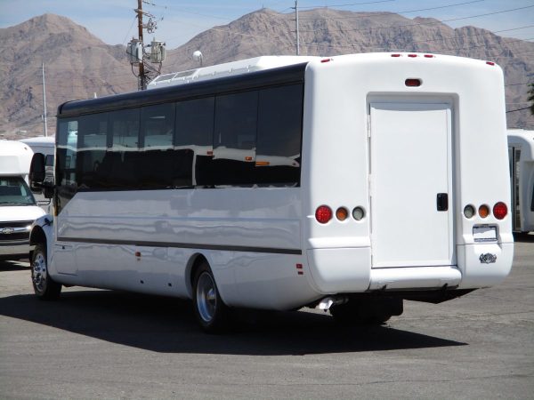 Rear Drivers Side View of 2013 ABC M1235 Shuttle Bus