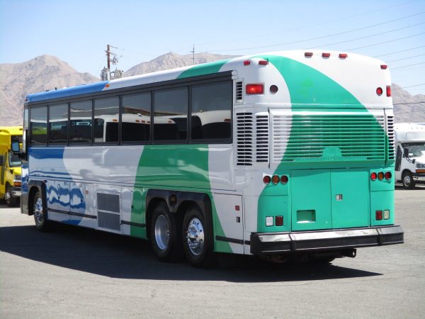 Rear Drivers Side View of 2004 MCI D4000 ADA Highway Coach