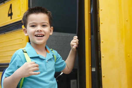 Child Happy Getting on School Bus