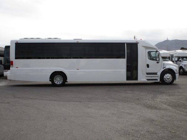 2018 Executive Coach Builders Luxury Shuttle Bus Passenger Side