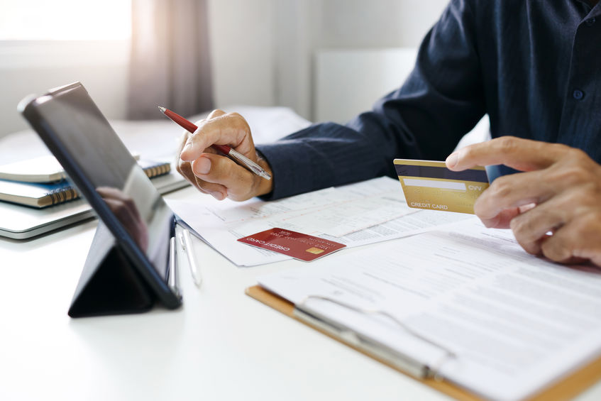 Businessman checking his credit score online